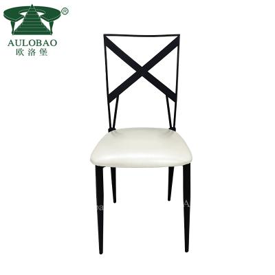 China Modern Wedding Banquet Metal Iron Event Furniture Cross Back Stackable Chair for sale