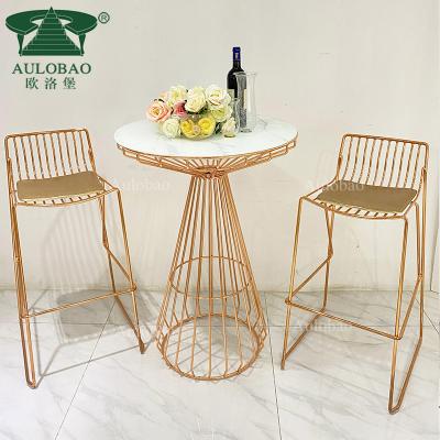 China Modern light luxury design bar furniture rose gold iron metal high bar glass table for sale