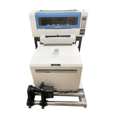 China Indoor Outdoor T-shirt Printing Advertising A2 Size DTF Printer With Dual Head XP600 With Powder Shaking Machine for sale