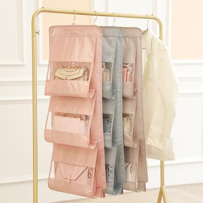 China Tasche Bag Wardrobe Custom Closet Hanging Storage Bag Transparent Organizer Viable Storage Bag for sale