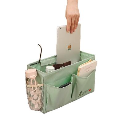 China High Quality Viable Storage Bag Portable Bedside Hanging Organizer Pouch With Hook Bed Pocket Storage Bag for sale