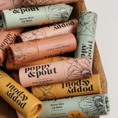 China Recyclable Biodegradable Cardboard Custom Logo Lip Balm Push Up Paper Tube for sale