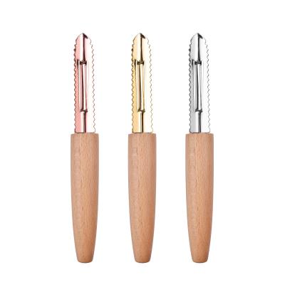 China Universal Metal Pumpkin Peeler Peeler Wooden Hand Function for sale