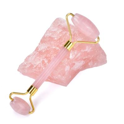 China 100% Natural Hand Held Non-Welded Stamping Rose Quartz Face Beauty Face Roller Custom Logo Face Lift Frame In Stock! for sale