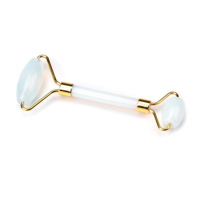 China Hand Held Custom Logo Skin Care Beauty Face Natural Quartz Crystal Jade Opal Facial Roller for sale