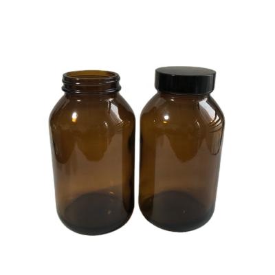 China 500ml Large Medicine Packer Capsule Medicine Amber Glass Pill Bottle With Black Round Screw Cap for sale