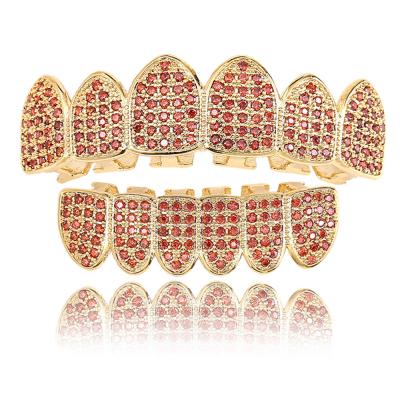 China Jewelry Environmental Friendly Punk Style Teeth Grillz Real Gold Plated Pink Crystal Rhinestone Teeth Grills For Sale for sale