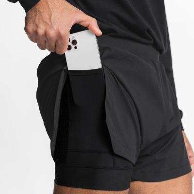 China 2022 Summer Fitness Sports Men Gym Elastic American Bodybuilding Hot Pants QUICK DRY Breathable Training Five-Point Shorts for sale