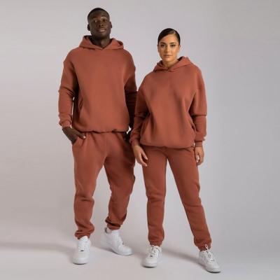 China Breathable Unisex Oversized Cotton Fleece Joggers Nylon Sweatsuit Tracksuit Sets For Women Men Hoodies and Sport Tracksuit Set for sale