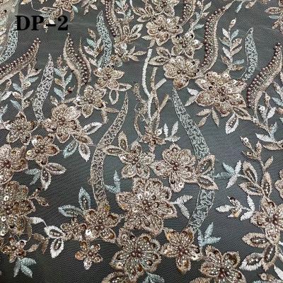 China Viable factory accept to customize design many designs in current wholesale African wedding lace Tulle beaded lace fabric in heavy high quality for sale