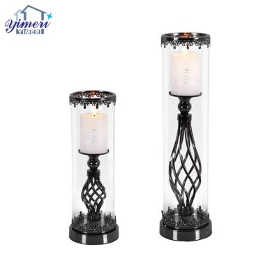 China Clear European style glass tube iron metal bronze twisted black candle holder for dinner table decor for sale