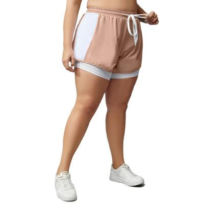 China Breathable Women Loose Two Pants Yoga Fitness Casual Quick Dry Large Size Fake Running Shorts Anti Track for sale