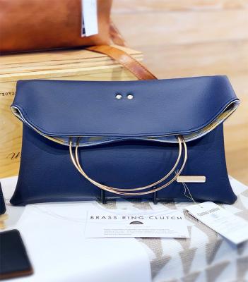 China 2022 fashion design cactus sustainable eco leather brass ring clutch elegant women's handbag folding leather clutch for sale