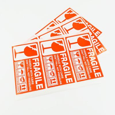 China Adhesive Red Shipping Cardboard Warning Label Fragile Paper Waterproof Printing Waterproof Sticker for sale