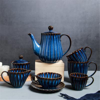 China Sustainable high-end home design bone china drinkware modern luxury pumpkin shape luxury tea set for sale