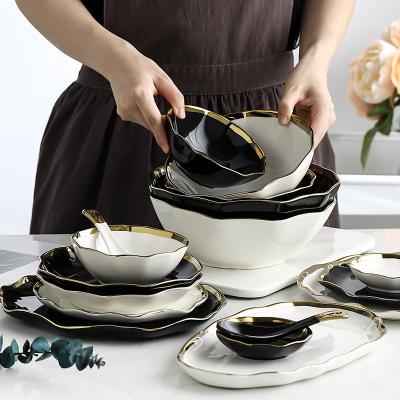 China Viable European rim design luxury gold tableware wedding restaurant custom ceramic dinner set wholesale for sale