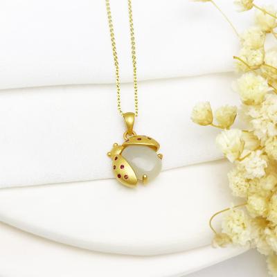 China Vintage Women's Jewelry Gold Beetle Inlaid Hetian Jade Pendant White 925 Sterling Silver Necklace for sale