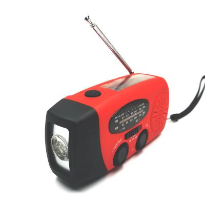 China Hand Crank Power Supply Mini AM/FM Radio PORTABLE Outdoor Solar Radio with 1000mAh Power Bank and 1W LED Flashlight USB Cable for sale