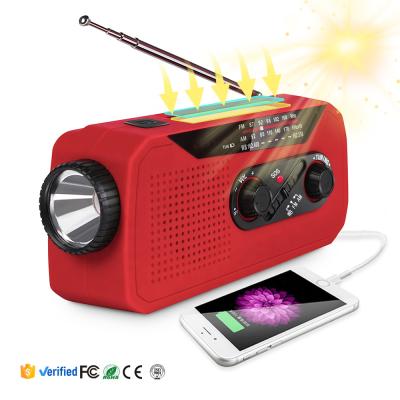 China Headphone jack; solar panel ; Low speaker; power bank; Flashlight ; Hand Crank Outdoor Solar Waterproof Dynamo AM/FM Portable Radio with LED Flashlight USB Charger Power Bank for sale