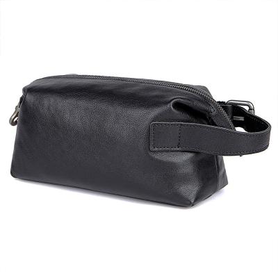 China Multifunctional Black Leather Waterproof Cosmetic Lady Bags Hanging Storage Leather Travel Storage Bag Men Box Bath Wash Cosmetic Bag for sale