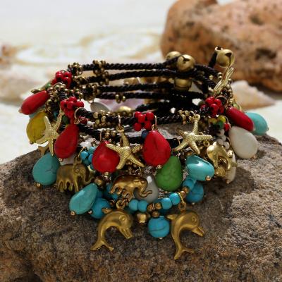 China 2022 Cute Wholesale Handmade Summer Beach Braided Wax Rope Foot Bracelet Turquoise Bohemian Dolphin Copper Charm Waterproof Anklets for sale