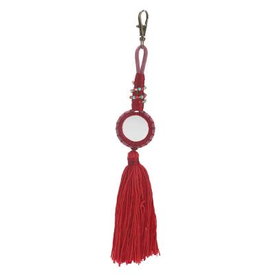 China Fashion Bohemian Handmade Charm Bag Pendant Tassel Wool Tassel Cotton Yarn Style Key Chain for sale