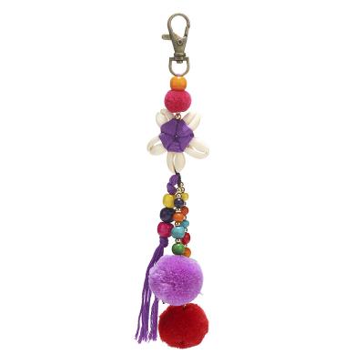 China Wooden Bohemian Decorative Handmade Shell Woven Flower Pompoms Key Chain Pendant Beads Style Tassel Key Chain DIY for sale