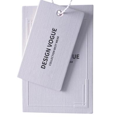 China Sustainable Apparel Taggs Labels Clothes Accessories Custom Design Name Tag Apparel Brand Tag for sale