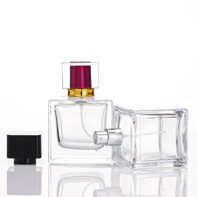 China 50ml 100ml Cosmetic Special Rectangular Glass Perfume Bottle With Custom Color Cap for sale