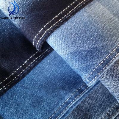 China 2202 soft anti-static super stretch core twill woven double cotton lycra bulge sanforize denim fabric for jeans garment for sale