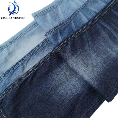 China Antistatic 704 Dark Blue 100% Cotton Denim Fabric Price Light Weight Denim Fabric For Shirt for sale