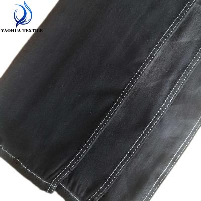 China Newest eco-friendly 2334 black color peep price anti-static stretch woven cotton polyester denim fabric for jeans for sale