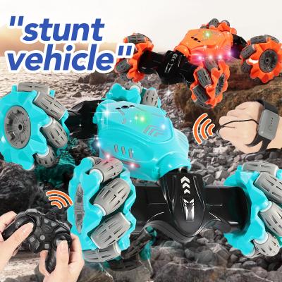 China RC Model Watch Gesture Sensor Stop Radio 4WD Remote Control Stunt Car For Kids for sale