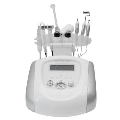 China Q09 newest face lift 9 in 1 portable multifunctional beauty salon facial machine with microdermabrasion for sale