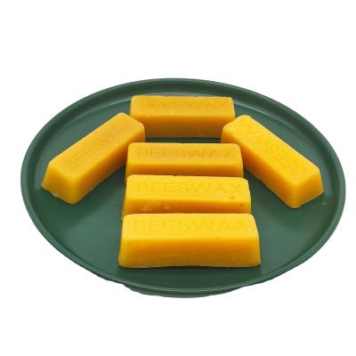 China Food Pharmacy Cosmetics Wholesale Bulk Organic Yellow Beeswax Bar With Cheap Price for sale