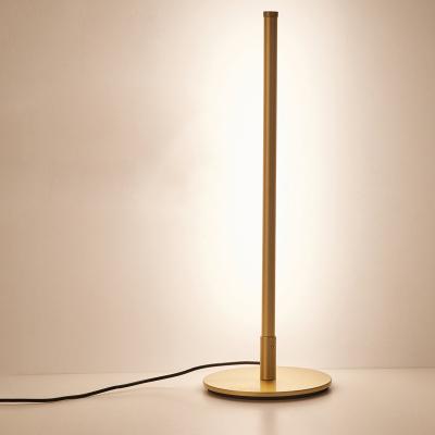 China Nordic Simple Modern Luxury Linear Led Iron Minimalist Art Gold Table Lamp Metal Desk Lamp for sale