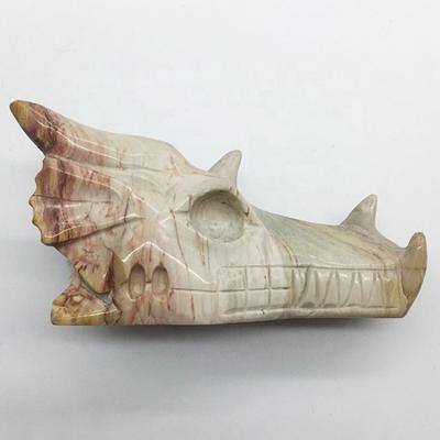 China China Wholesale Hand Carved Natural Petrified Wooden Head Crystal Dragon Skulls for sale