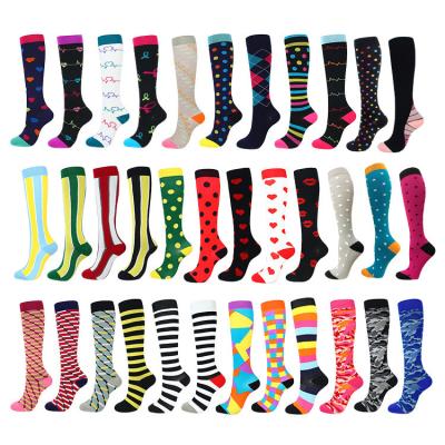 China New Wholesale Custom Antibacterial 20-30mmhg Colored Dots Football Medical High Running Sports Compression Recycling Socks for sale