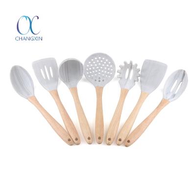 China Sustainable 7pcs Silicone Nonstick Cookware Utensil Sets With Wooden Handle for sale