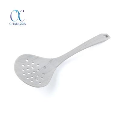 China Sustainable Kitchen Cooking Spoon Silicone Draining Spoon for sale