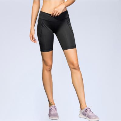 China Mid Waist Antibacterial Ladies Running Shorts With Pockets High Elastic Yoga Quarrel Yoga Shorts For Fitness for sale