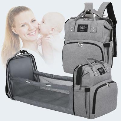 China NEW Travel USB Travel Waterproof Maternity Nursing Backpack Foldable Crib Mommy Nappy Diaper Bag With Bed Crib for sale