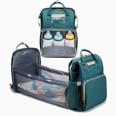 China Classic Water Resistant Diaper Bags Backpack Large Capacity Diaper Bag Foldable Crib Crib Hutch Bag With Changing Station for sale