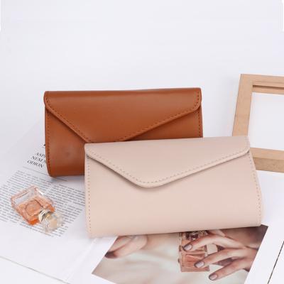 China Wholesale Waterproof Wrap To Shape Large Capacity Ladies Grasp Soft Purse Wallet Case PU Women Handbags Wallet for sale