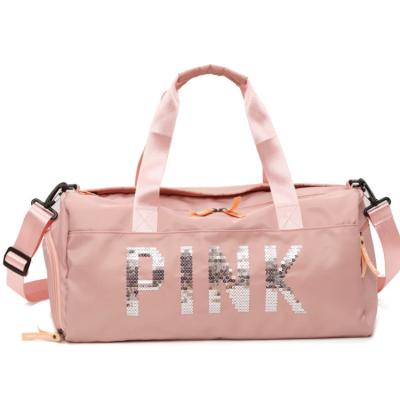 China Custom Made Pink Duffel Bag And Fashionable Women Sports Bag Mini Overnight Travel Fitness Gym Bag With Raincoat for sale