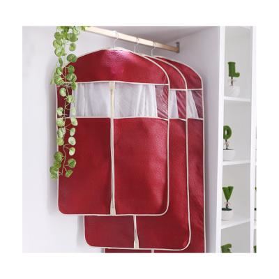 China High Quality Korean Embossing Nonwoven Garment Bags Dustproof Biodegradable Wrinkle Handle Zipper Design Garment Cover for sale