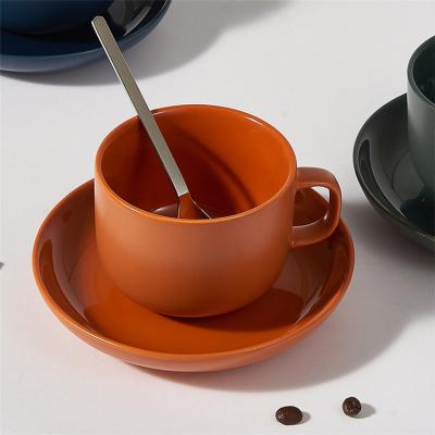 China Viable wholesale matte orange modern ceramic latte modern ceramic tea cups custom restaurant coffee cup with saucer for sale