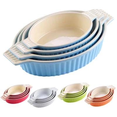 China Kitchen Safe Multicolor Oval Bakeware Ceramic Microwave Oven Dishes Cooking Pans With Double Handle for sale