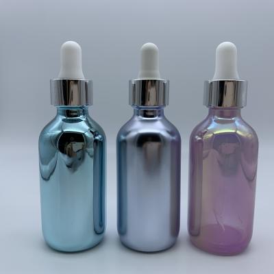 China Morden 10ml 15ml 20ml 30ml 50ml 100ml plated glass dropper essential oil bottle with dropper pipette for sale