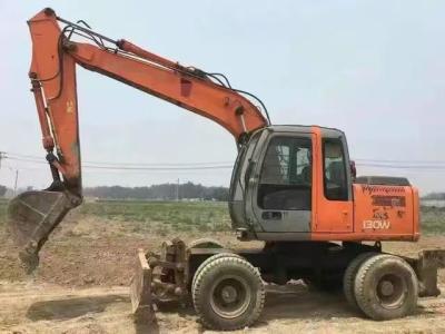 China Used wheeled Hitachi 130 excavator, in good condition and at a discounted price for sale